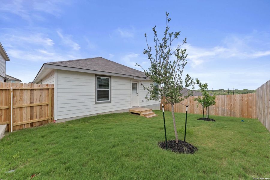 Exterior details and patio area of a home in Stonehill, San Antonio (Image 18).