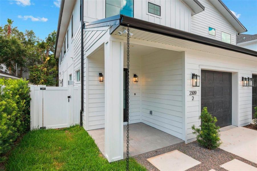 Front exterior of a new home in , Tampa, FL, highlighting curb appeal (Image 18).