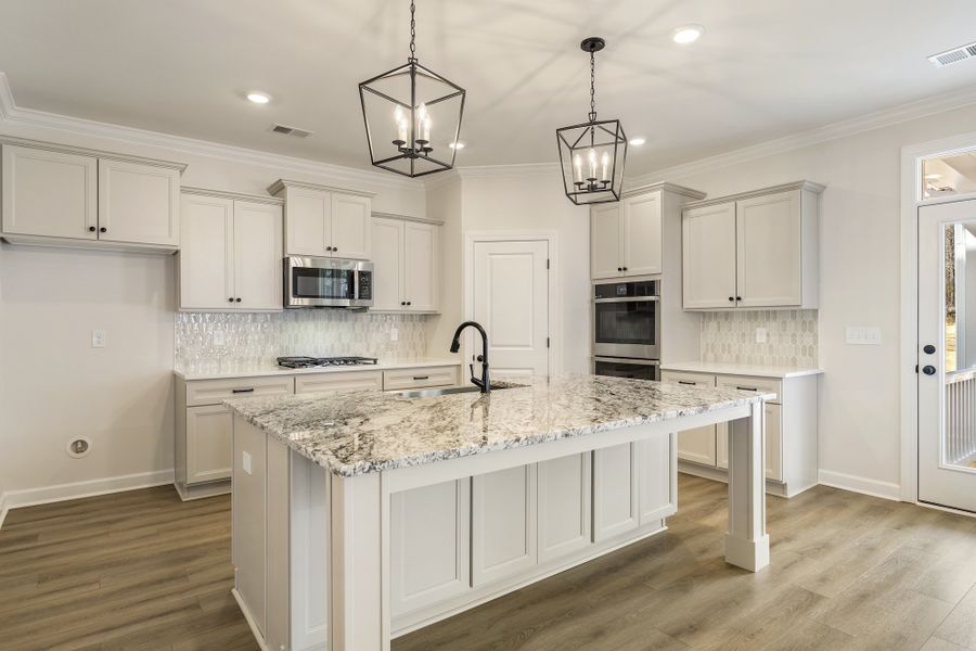 Furnished interior view inside a new home in Landing at Pine Lake, Anderson (Image 8).