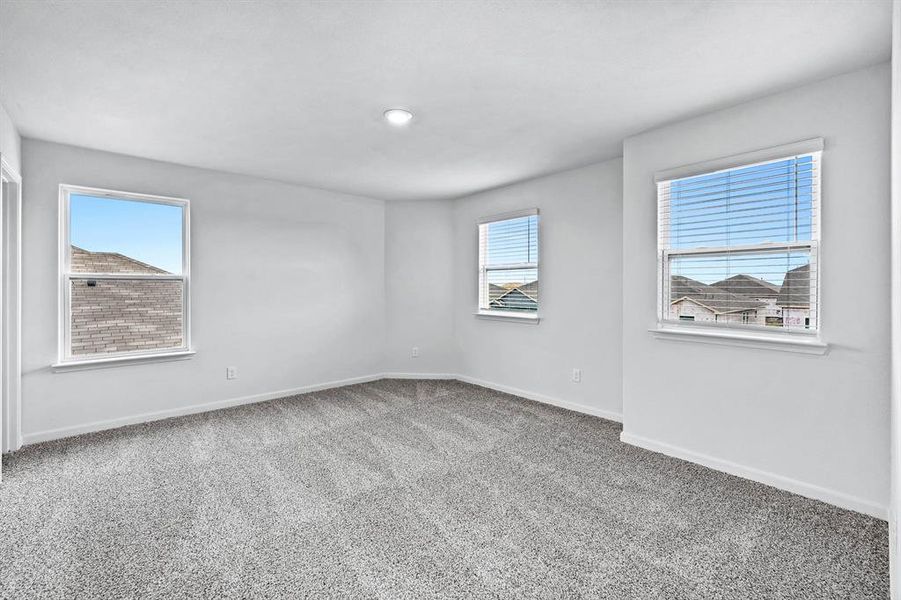 Spare room featuring carpet floors