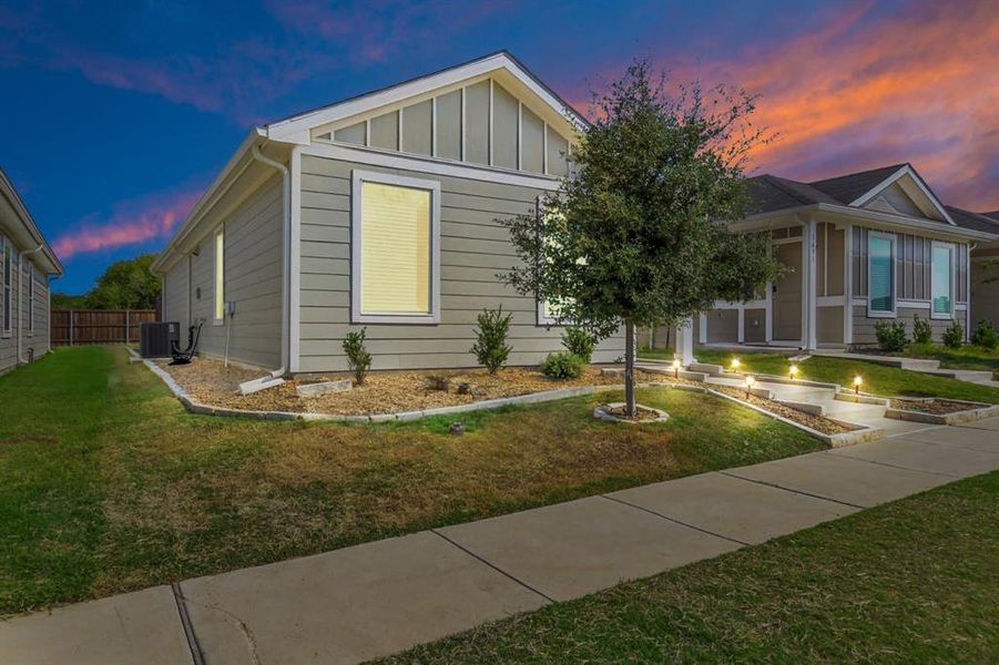 Front exterior of a new home in , Ferris, TX, highlighting curb appeal (Image 24).