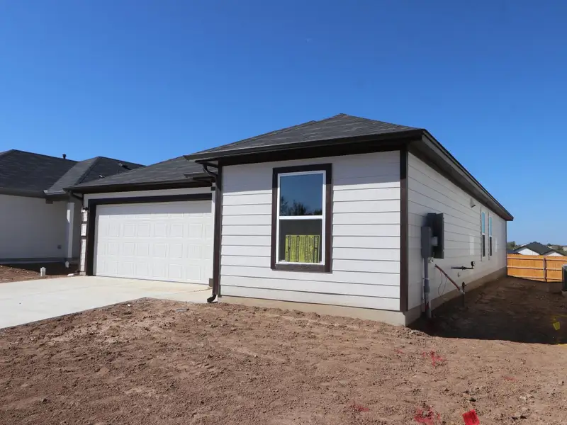 Exterior details and patio area of a home in Marble Creek Crossing, Austin (Image 16). Exterior details and patio area of a home in Marble Creek Crossing, Austin (Image 16).