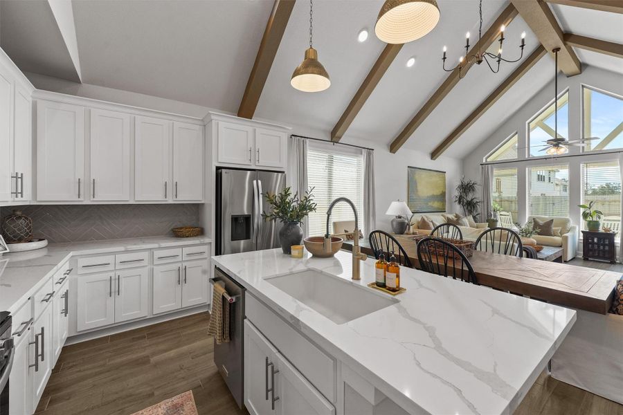 Beautiful and modern kitchen opened to the dining and living room - entertainers dream Beautiful and modern kitchen opened to the dining and living room - entertainers dream