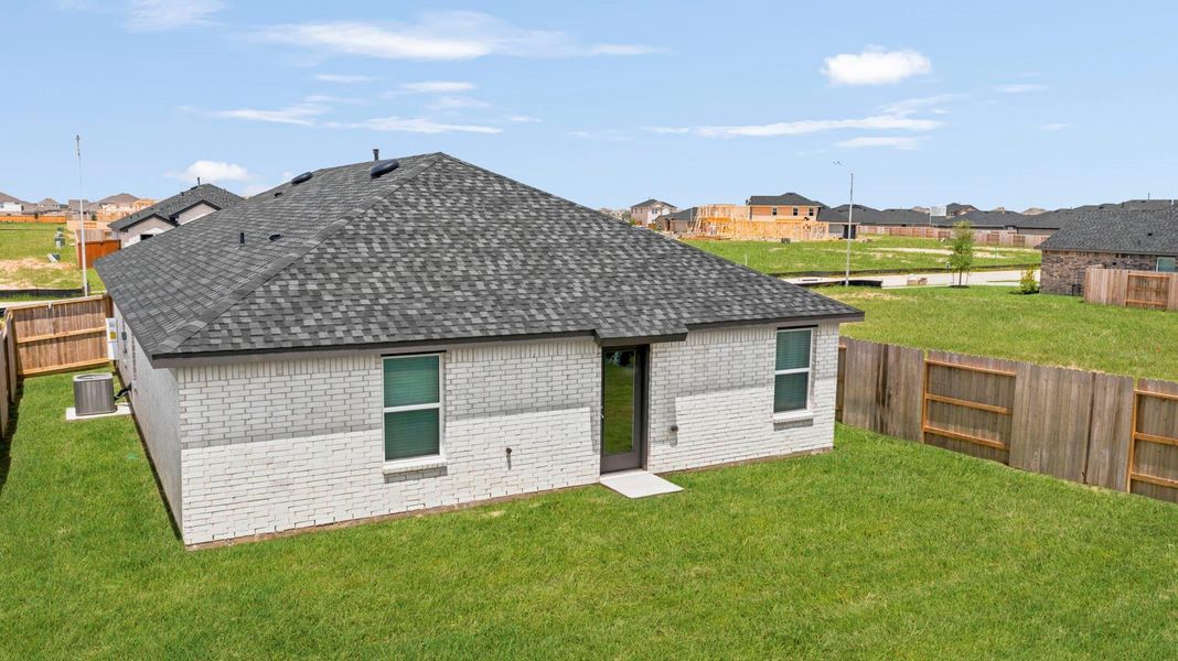 Exterior details and patio area of a home in Sunterra Lakes, Brookshire (Image 19). Exterior details and patio area of a home in Sunterra Lakes, Brookshire (Image 19).