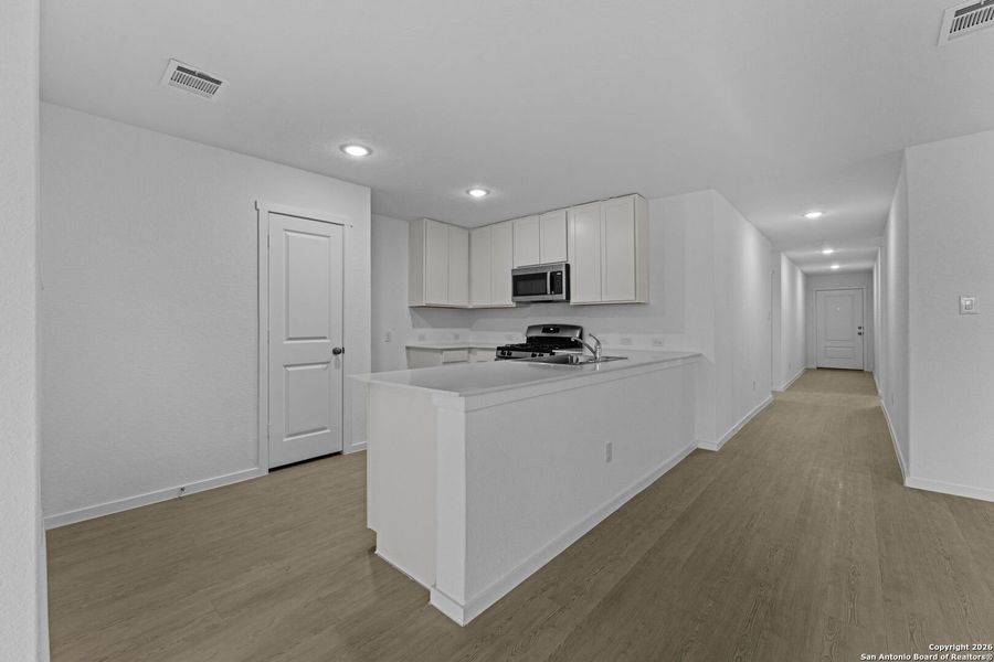 Furnished interior view inside a new home in , New Braunfels (Image 8).