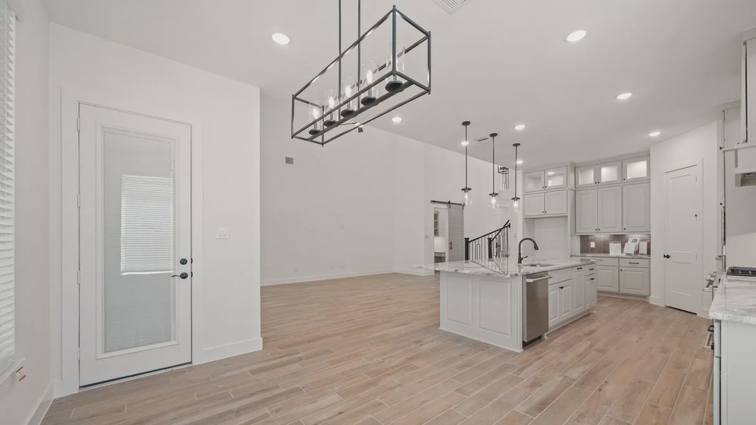 Representative furnished interior of a home built from the Waterloo by Chesmar Homes in Attwater 65's, Waller (Image 7).