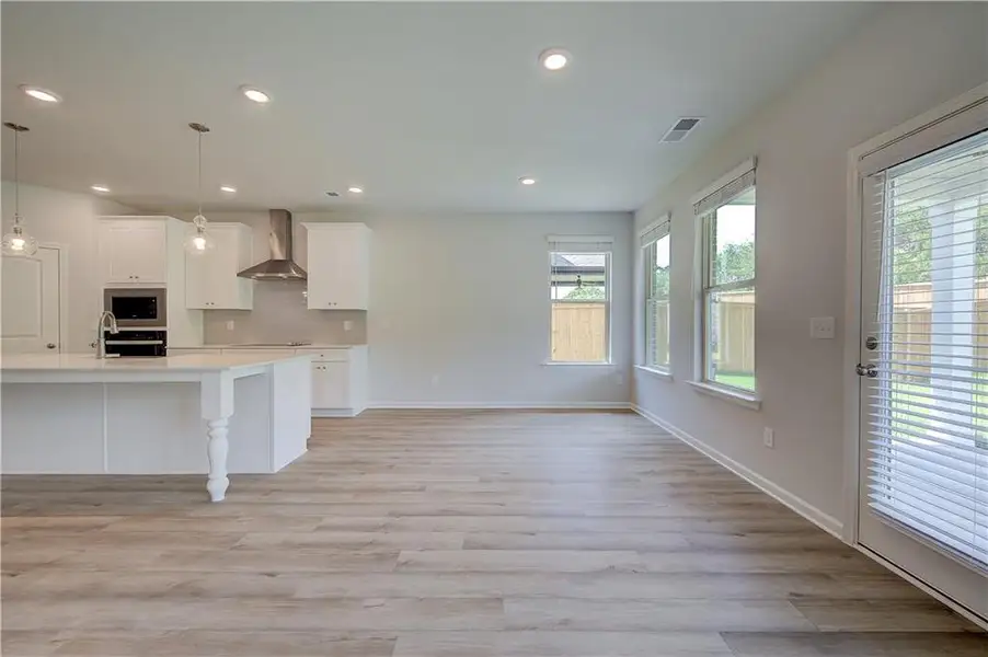 Spacious, unfurnished interior of a new home in Adagio, Dacula (Image 25).
