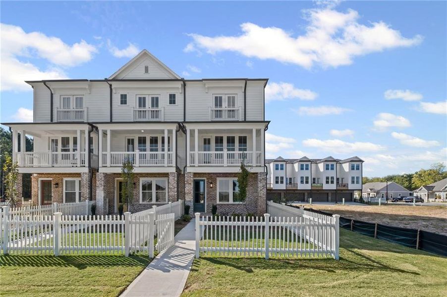 Front exterior of a new home in The Village at River Green, Canton, GA, highlighting curb appeal (Image 18).