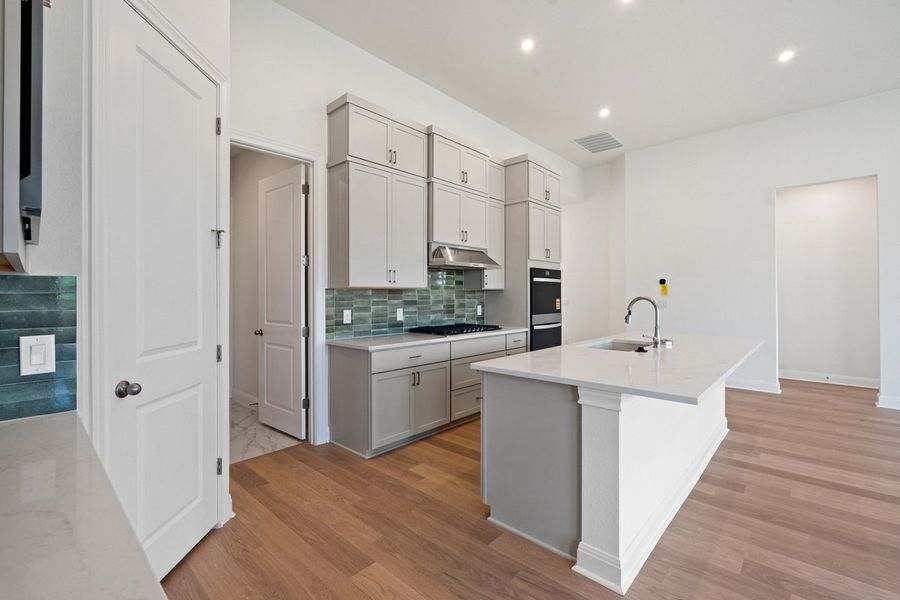 Furnished interior view inside a new home in Persimmon, Buda (Image 12).