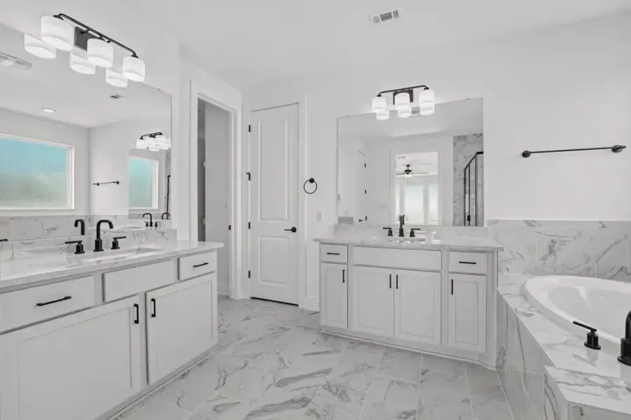 Furnished interior view inside a new home in Travisso, Leander (Image 10).