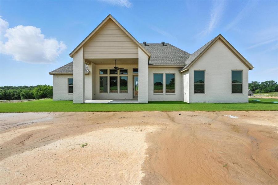Front exterior of a new home in , Poolville, TX, highlighting curb appeal (Image 17). Front exterior of a new home in , Poolville, TX, highlighting curb appeal (Image 17).