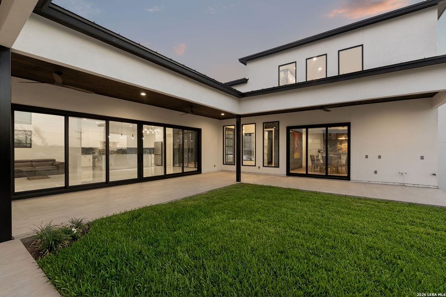 Exterior details and patio area of a home in , San Antonio (Image 33).