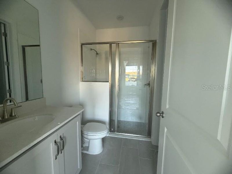 Spacious, unfurnished interior of a new home in Parkview at Hamlin, Winter Garden (Image 11).