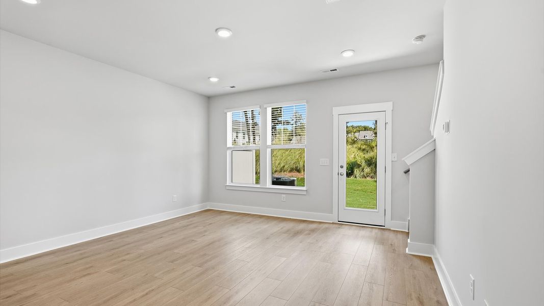 Hardwood flooring and high standards define this vibrant family room ideal for everyday living at the Clarke Townes community Hardwood flooring and high standards define this vibrant family room ideal for everyday living at the Clarke Townes community