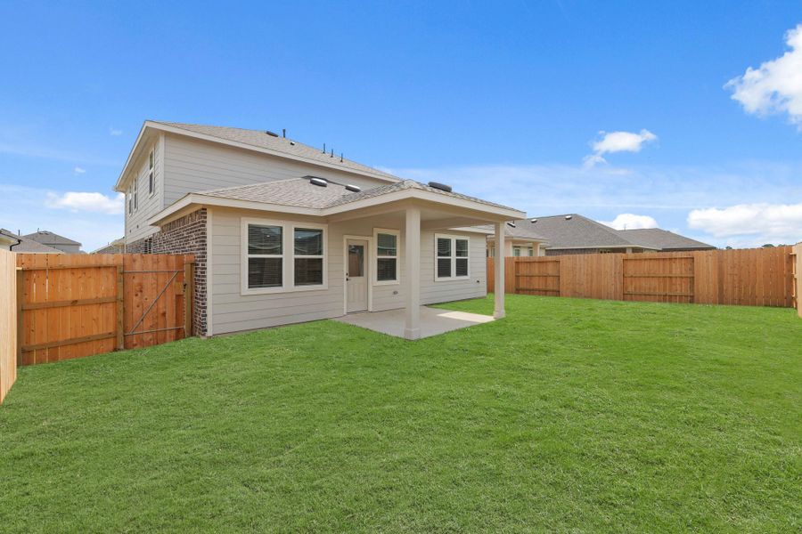 Huge backyard with covered patio Huge backyard with covered patio