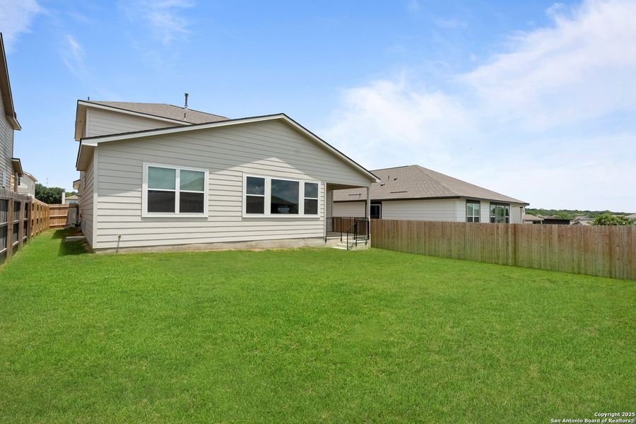 Front exterior of a new home in Skybrooke, San Antonio, TX, highlighting curb appeal (Image 2). Front exterior of a new home in Skybrooke, San Antonio, TX, highlighting curb appeal (Image 2).