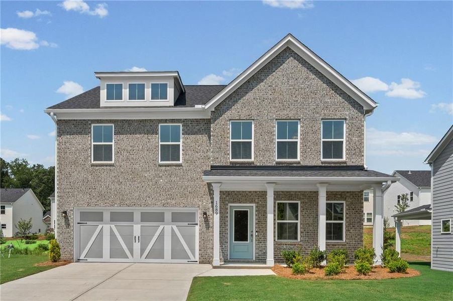 Front exterior of a new home in Berkeley Mill, Cumming, GA, highlighting curb appeal (Image 1). Front exterior of a new home in Berkeley Mill, Cumming, GA, highlighting curb appeal (Image 1).