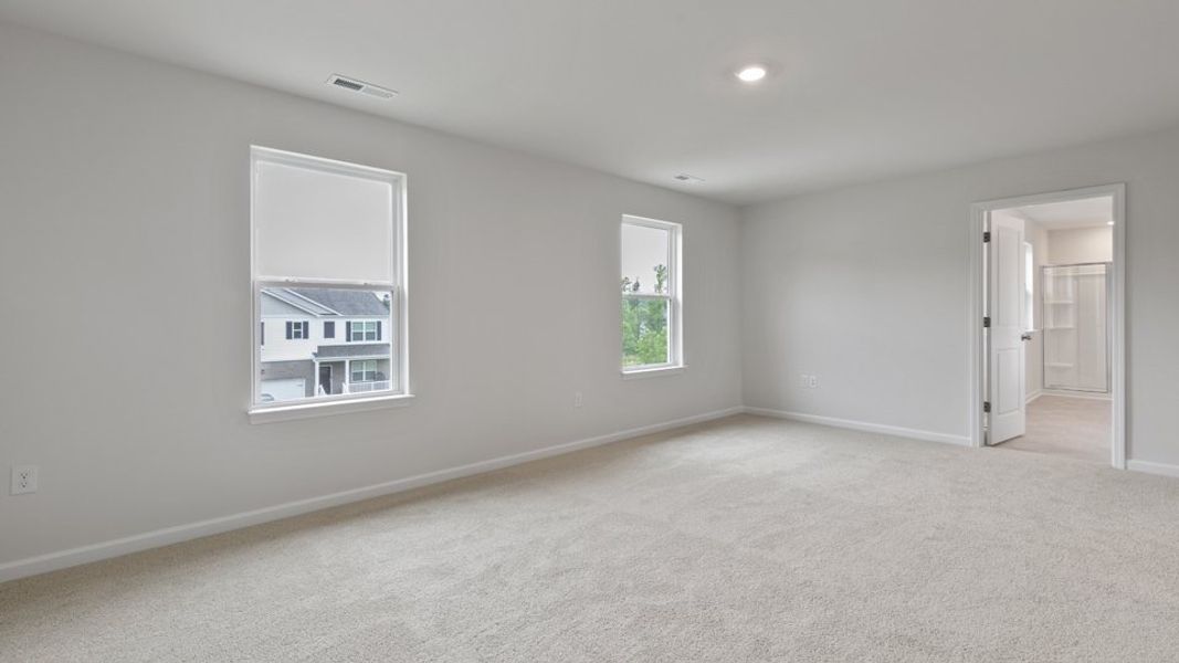 Spacious, unfurnished interior of a new home in Villa Grande, Winterville (Image 27).