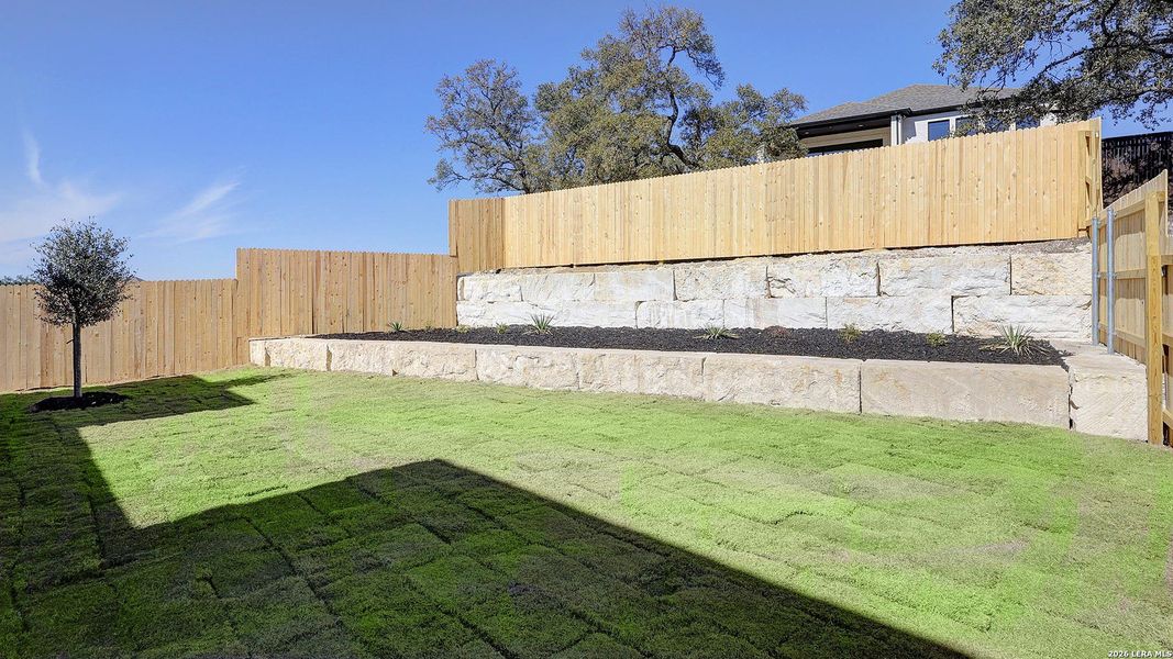 Exterior details and patio area of a home in The Ranches at Creekside, Boerne (Image 4).
