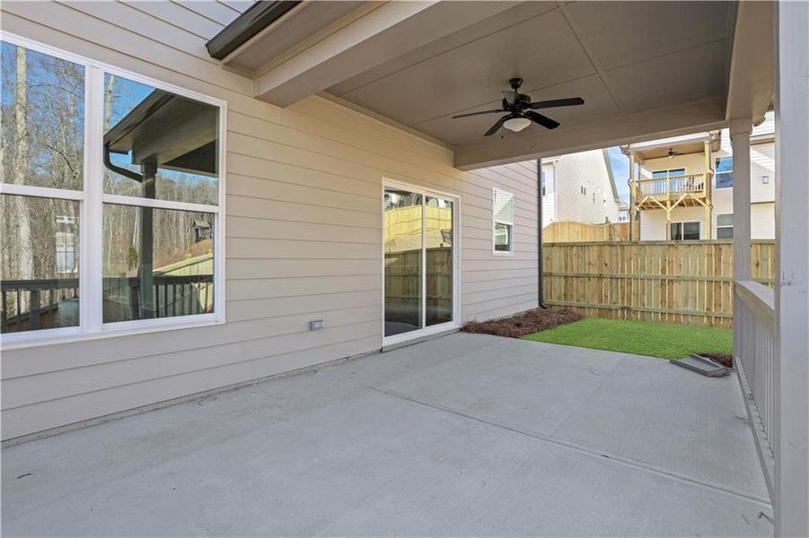 Exterior details and patio area of a home in Marble Tree, Ball Ground (Image 26).