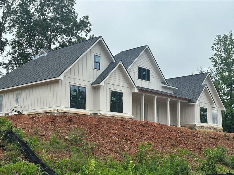 Front exterior of a new home in , Commerce, GA, highlighting curb appeal (Image 2).