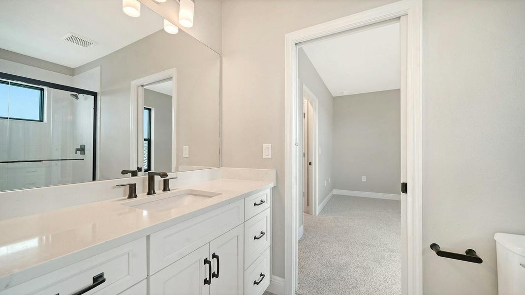 Furnished interior view inside a new home in Windward Real Estate and Homes for Sale in Sarasota, FL - Neal Communities, Lakewood Ranch (Image 18).