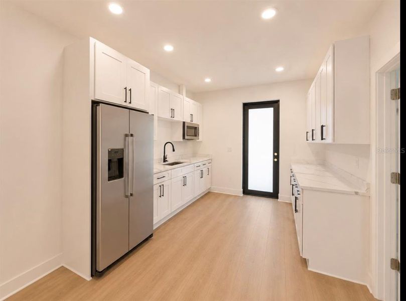 Furnished interior view inside a new home in , Brooksville (Image 7).