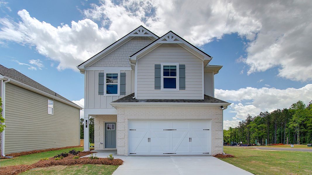 Representative exterior photo of a completed home built from the Reagan by DRB Homes in Enclave at Evergreen, Fairburn, GA (Image 21).