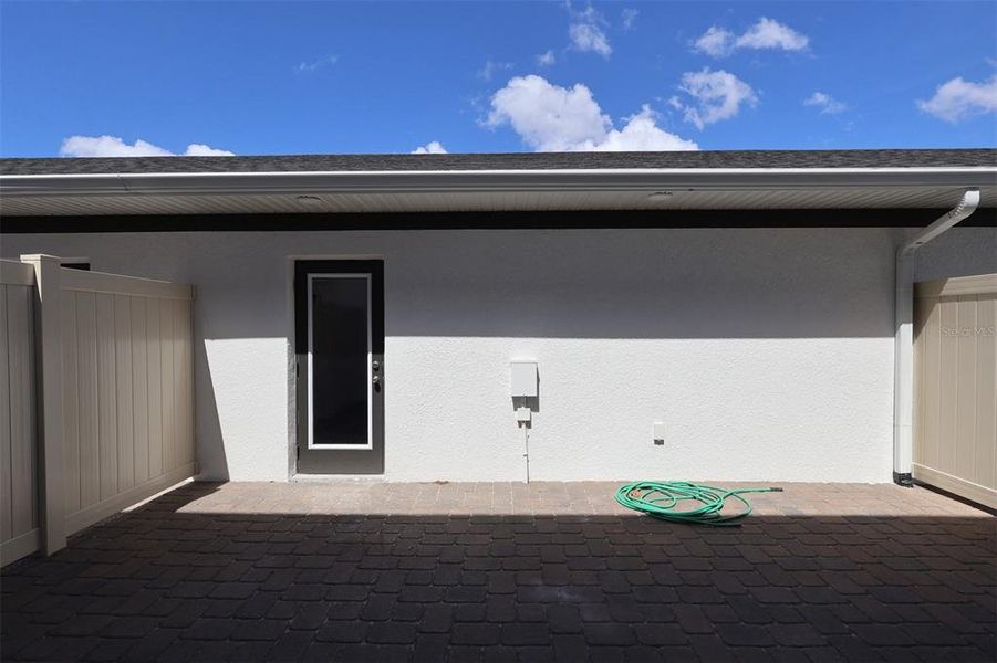 Exterior details and patio area of a home in Center Lake on the Park, St. Cloud (Image 16).