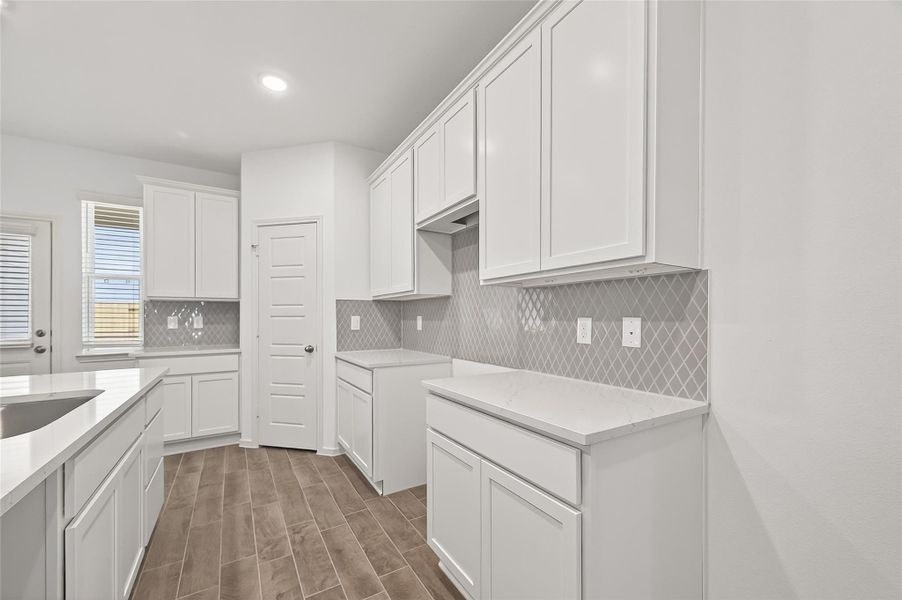 Furnished interior view inside a new home in , Iowa Colony (Image 11).