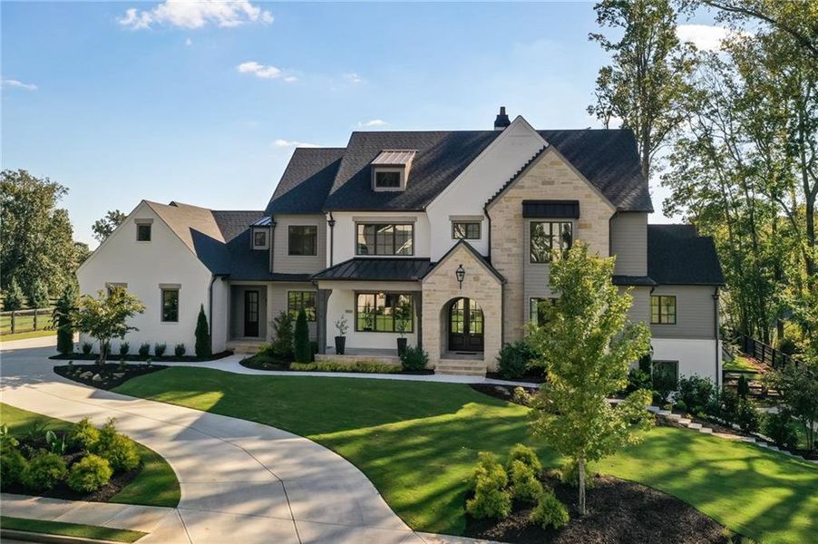 Front exterior of a new home in , Milton, GA, highlighting curb appeal (Image 27).