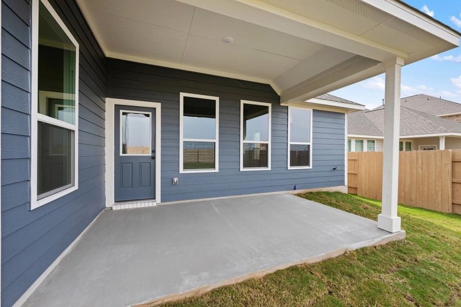 Exterior details and patio area of a home in The Colony 50s, Bastrop (Image 27).