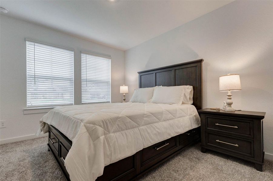 Furnished interior view inside a new home in Canterra Creek 45' and 50' Homesites, Iowa Colony (Image 9).