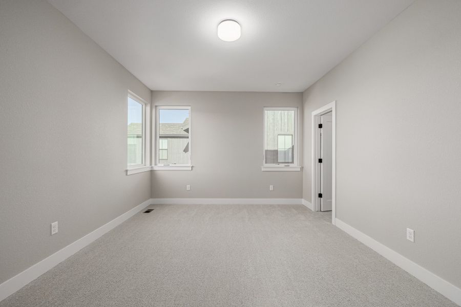 Spacious, unfurnished interior of a new home in West Grange, Longmont (Image 31).