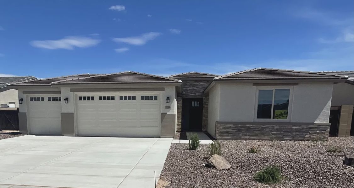 Front exterior of a new home in Acacia at Santana, Yuma, AZ, highlighting curb appeal (Image 1). Front exterior of a new home in Acacia at Santana, Yuma, AZ, highlighting curb appeal (Image 1).