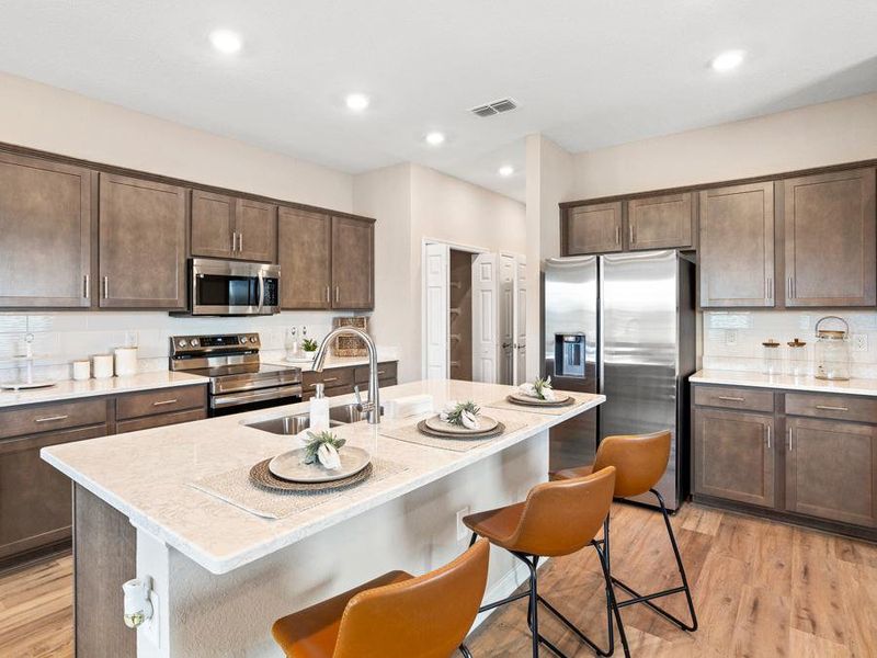 Your new kitchen has beautiful, professionally selected features and finishes - Mariposa townhome by Highland Homes