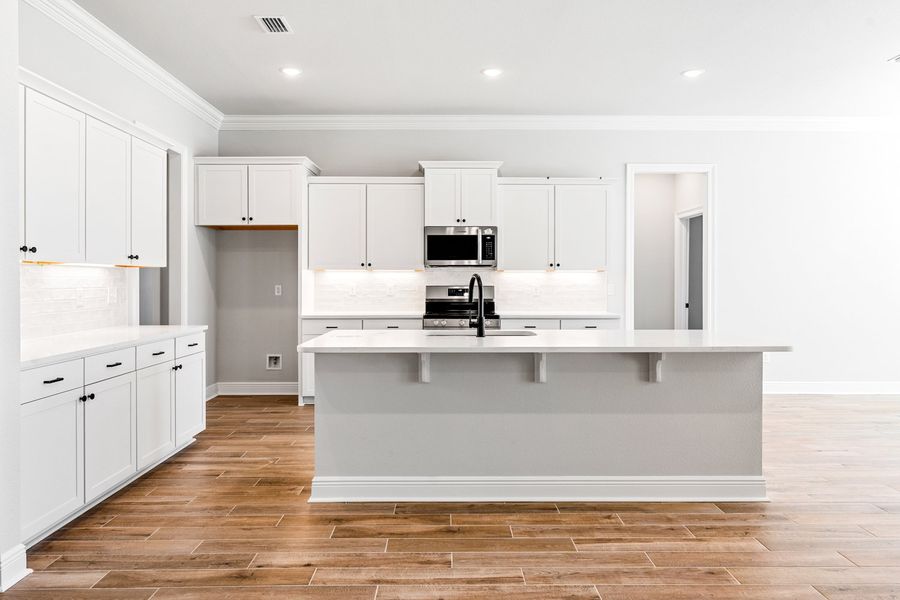 Furnished interior view inside a new home in Natureview, Freeport (Image 5).