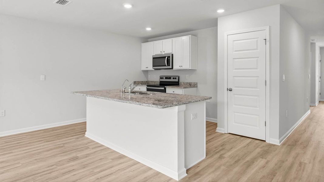 Representative furnished interior of a home built from the Freeport by D.R. Horton in Sunny Hills, Chipley (Image 8).