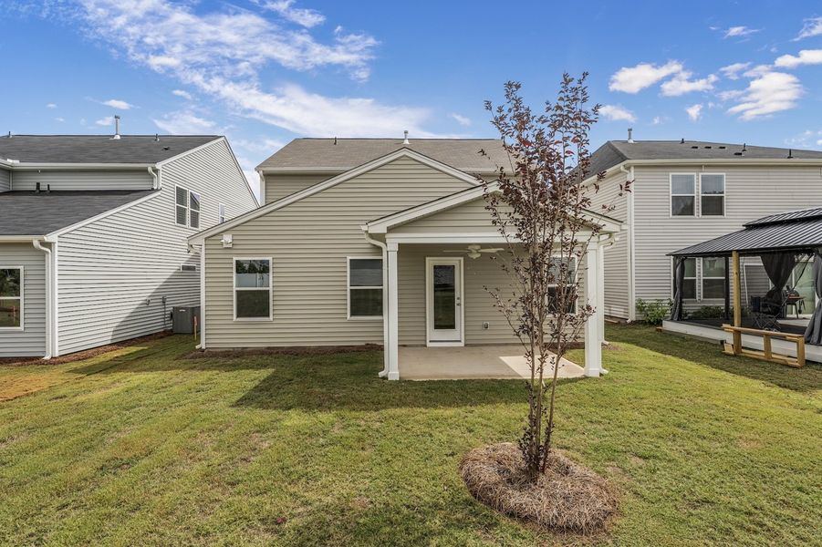 Exterior details and patio area of a home in Wingate, Inman (Image 17). Exterior details and patio area of a home in Wingate, Inman (Image 17).