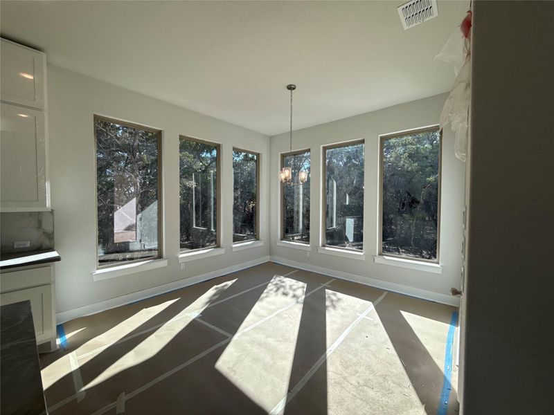 Breakfast Area off of Kitchen with amazing lighting