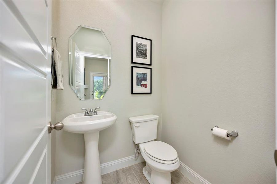 Half Bath located on the first level off kitchen and mudroom.