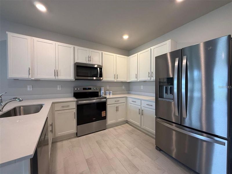 Furnished interior view inside a new home in , Punta Gorda (Image 8). Furnished interior view inside a new home in , Punta Gorda (Image 8).