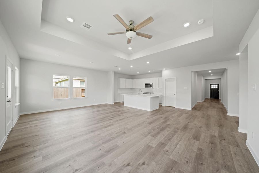 Spacious, unfurnished interior of a new home in Sunterra, Katy (Image 13).