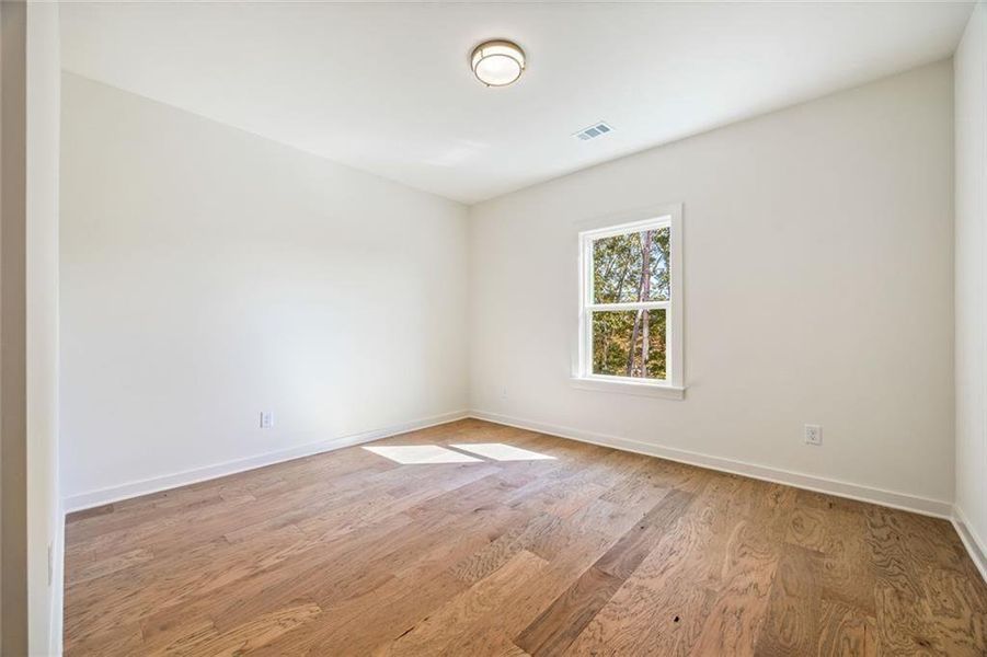 Spacious, unfurnished interior of a new home in Long Hollow Landing, Gainesville (Image 52).