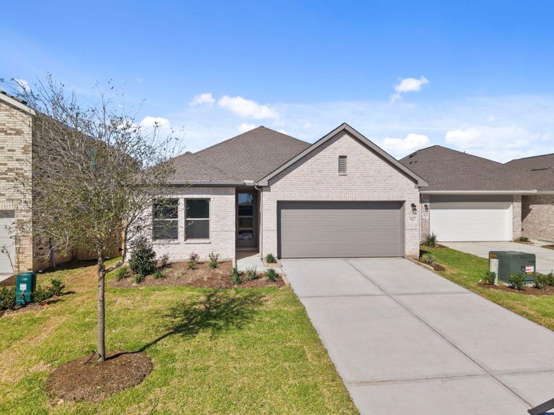 Front exterior of a new home in Windrose Green, Angleton, TX, highlighting curb appeal (Image 21).
