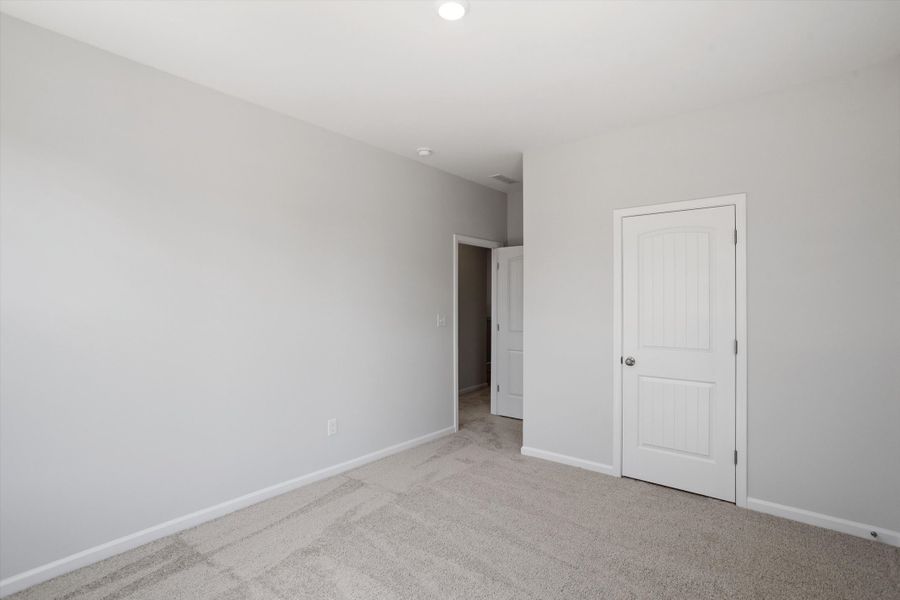 Spacious, unfurnished interior of a new home in Sweetbrier, Durham (Image 28).