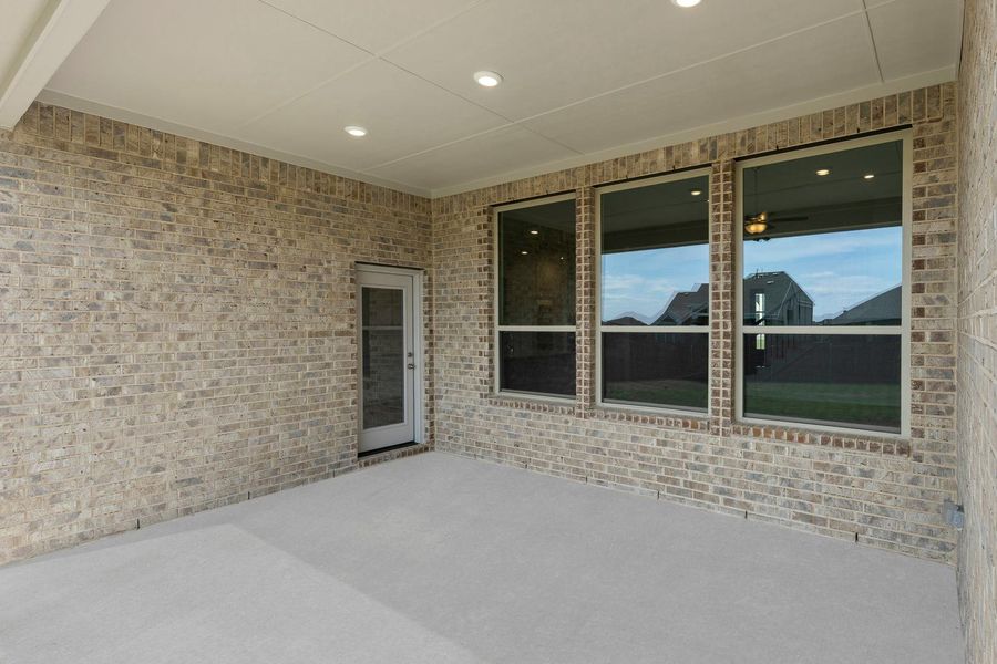 Exterior details and patio area of a home in Park Trails, Forney (Image 3).