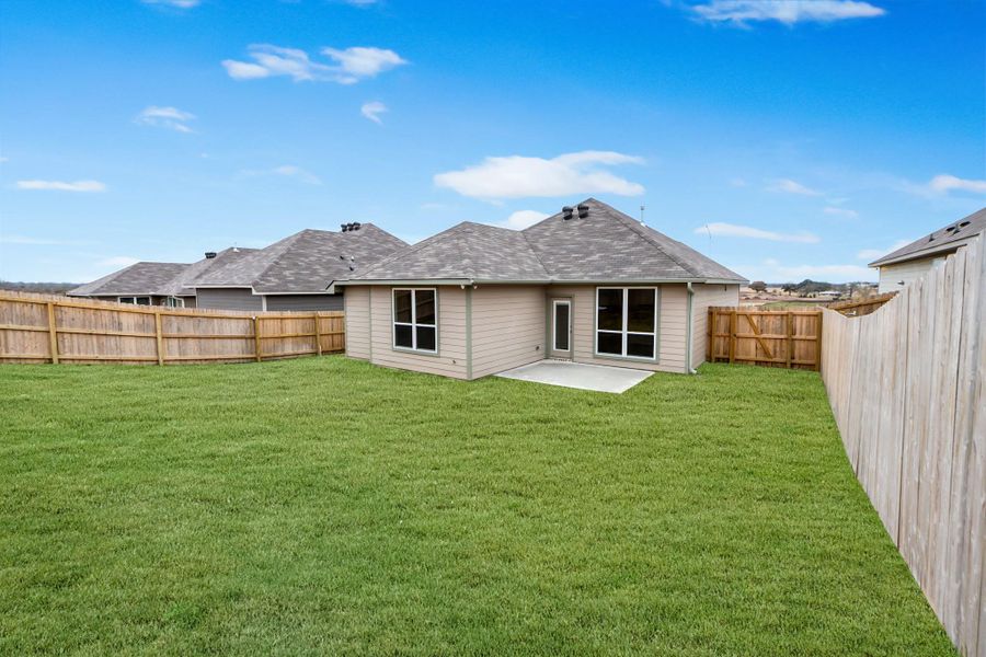 Front exterior of a new home in , Brenham, TX, highlighting curb appeal (Image 2). Front exterior of a new home in , Brenham, TX, highlighting curb appeal (Image 2).