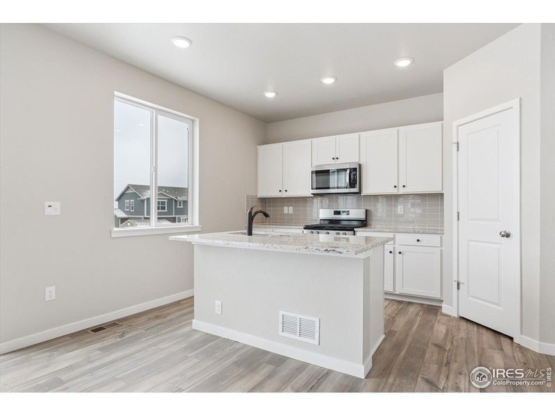 Furnished interior view inside a new home in The Overlook at Johnstown Farms, Johnstown (Image 7).