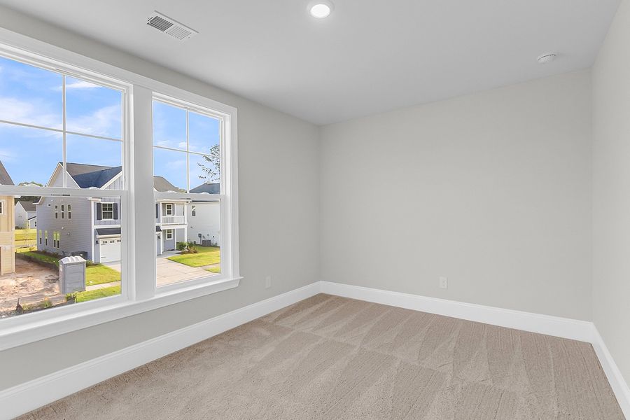 Spacious, unfurnished interior of a new home in Pineland Preserve, Summerville (Image 39).